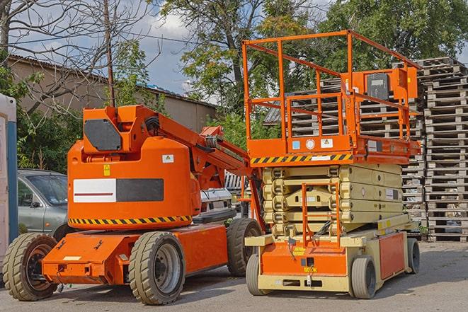 heavy-duty forklift maneuvering through a busy warehouse in Middletown, CT